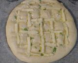 A picture of step 6 of Cheesy Garlic Bread.