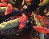A picture of step 12 of Karniyarik (Stuffed eggplant).