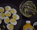 Foto langkah ke 3 dari resep Spooky Spider Deviled Eggs.