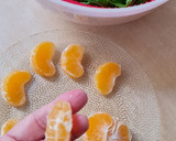 Foto del paso 2 de la receta: Ensalada agridulce de mandarina y rúcula