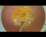 A picture of step 8 of Yam balls and egg into egg.