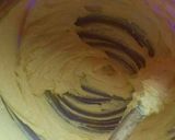 A picture of step 1 of Lemon cake with rough butter iced.