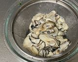 A picture of step 1 of Oyster pickled in Garlic Olive Oil.