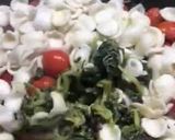 A picture of step 4 of Orecchiette with Broccoli Rabe and Cherry Tomatoes.