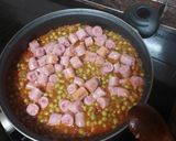 Foto del paso 4 de la receta: Arvejas compuestas con longaniza, arroz blanco y huevo frito