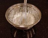 A picture of step 2 of Vanilla Layer Cake with Whipped Chocolate Ganache Filling and Whipped Coconut Cream Frosting.