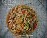 Foto langkah ke 4 dari resep Tumis tongkol asap kemangi.