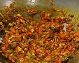 A picture of step 4 of Veg Schezwan rice.