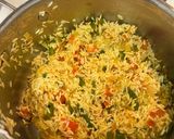 A picture of step 6 of Yellow Rice with Jalapeños and Tomatoes.