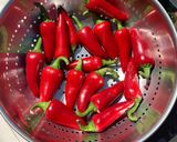 A picture of step 1 of Stuffed red chilli pickle.