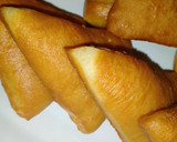 A picture of step 7 of Triangle shaped stuffed bread.