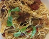 A picture of step 4 of Angel Hair Pasta Garlic, Tomatos and Achar Masala.