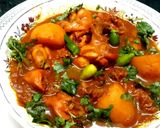 A picture of step 1 of Chicken in tomato gravy.