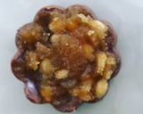 A picture of step 4 of Gur dhana chocolate bitesWhen its engagement or wedding jaggery and coriander seeds are offered.