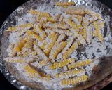 A picture of step 3 of Masala Corn Fries.