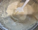A picture of step 4 of Baked Glazed Donuts.