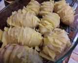 A picture of step 3 of Hassle back potatoes.