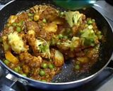 A picture of step 14 of Aloo Gobi Matar (Potato, Cauliflower, and Pea Curry).