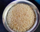 A picture of step 5 of Broken rice tomato bath.