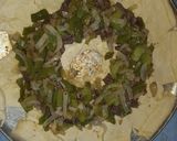 A picture of step 8 of Philly cheesesteak crescent roll.