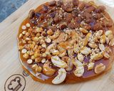 A picture of step 10 of Mixed nuts chikki pizza (chizza).