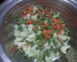 A picture of step 2 of Potato baked dish with garlic bread.