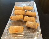 A picture of step 5 of Ham and cheese spicy egg rolls.