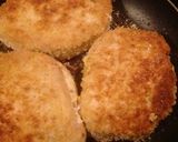 A picture of step 7 of Herb and Cheese Stuffed Pork Chops.