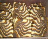 Foto langkah ke 7 dari resep Bolu Macan Kukus.