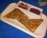 A picture of step 3 of Basil semolina toast.