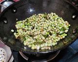 A picture of step 3 of Green pigeon pea usli (stir fried lentils).