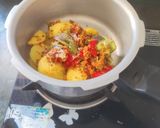 A picture of step 4 of Kathiyavadi Bharva aloo baingan.