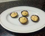 A picture of step 9 of Mango mousse with choco cup.
