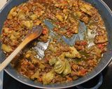 Foto del paso 5 de la receta: Arroz con alcachofas, setas y chorizo