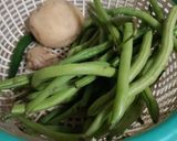 A picture of step 1 of French beans sabzi.