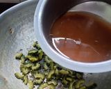 A picture of step 8 of Pavakkai /bitter gourd pitlai.