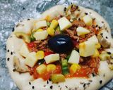 صورة لخطوة 4 من وصفة ميني بيتزا
