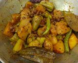 A picture of step 4 of Kumro Potoler Chokka (Bengali Style veg sabzi).