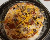 A picture of step 4 of Funtime Pizza with the Grandkids.