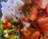 A picture of step 1 of Japanese cucumber,onion and tomato raita.