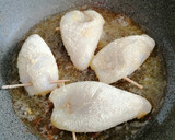 Foto del paso 9 de la receta: Calamares rellenos con langostinos Sabor Cookpad