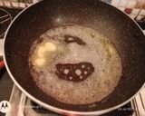A picture of step 7 of Bhat karela pur with white sauce.