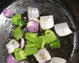 A picture of step 2 of Leftovers chicken achaari fajita.