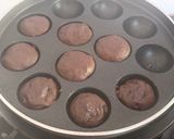 A picture of step 12 of Healthy Atta Jaggery Muffins in Appe Pan.
