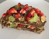 A picture of step 4 of Breakfast amazingness😋 French toast with cereals and fresh fruits🍓🍇.