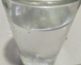 A picture of step 1 of Rooh Afza with basil.