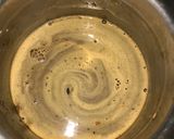 A picture of step 7 of Appam with coconut milk.