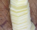 Foto del paso 1 de la receta Patatas al horno con nata, mozzarella, jamón York y huevo