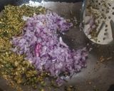 A picture of step 8 of Bharva karele.