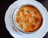 A picture of step 5 of Tasty masaledar Kadhi pakoda with phulka roti for Gujarati dinner.